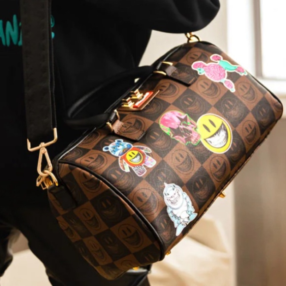 Sprayground Global Mogul Popaganda Ron English Edition Mini Duffle